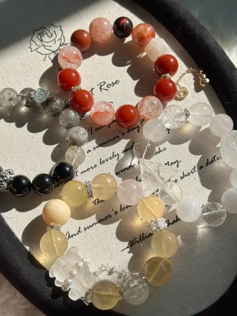 chinese zodiac bracelet made with natural crystal beads and gemstone charms