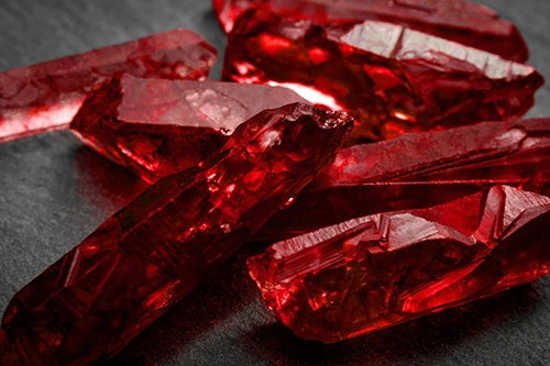 Deep red garnet fire element crystals in raw crystal form