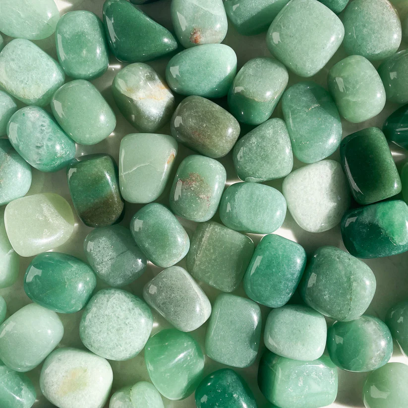 Green aventurine stones symbolizing Wood Element meaning and growth energy
