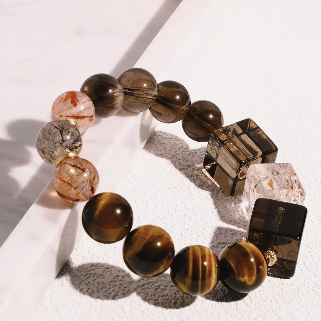 ox zodiac meaning crystal bracelet with tiger’s eye and smoky quartz