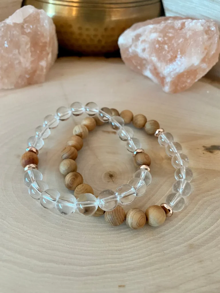 sheep zodiac meaning bracelet made with clear quartz and natural wood beads