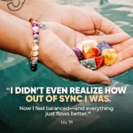 7 chakra bracelet for meditation worn on wrist with healing crystals in hand