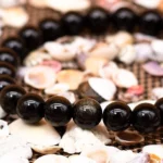 black obsidian bracelet bead texture natural black stone detail