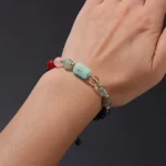 Close-up of a cancer birthstone bracelet featuring luminous Moonstone and soft Rose Quartz beads.