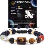 Infographic of the capricorn birthstone bracelet identifying Garnet, Tiger's Eye, and Black Obsidian.