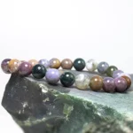 moss agate crystal bracelet natural stone beads on rock