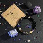 sagittarius crystal bracelet flat lay with raw crystals amethyst lapis lazuli natural background