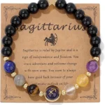 sagittarius crystal bracelet flat lay with raw crystals amethyst lapis lazuli natural background