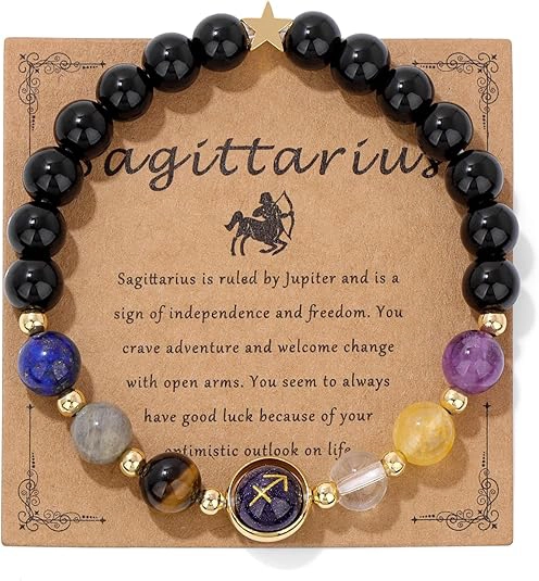 sagittarius crystal bracelet flat lay with raw crystals amethyst lapis lazuli natural background
