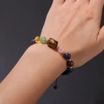 Close-up of a virgo birthstone bracelet featuring soft teal Amazonite and deep blue Lapis Lazuli beads on a wrist.