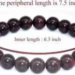 bloodstone bead bracelet dark green red beads texture close up