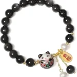good luck bracelet for women with black beads and lucky cat pendant