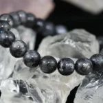 labradorite crystal bracelet natural gemstone beads on crystal stone background