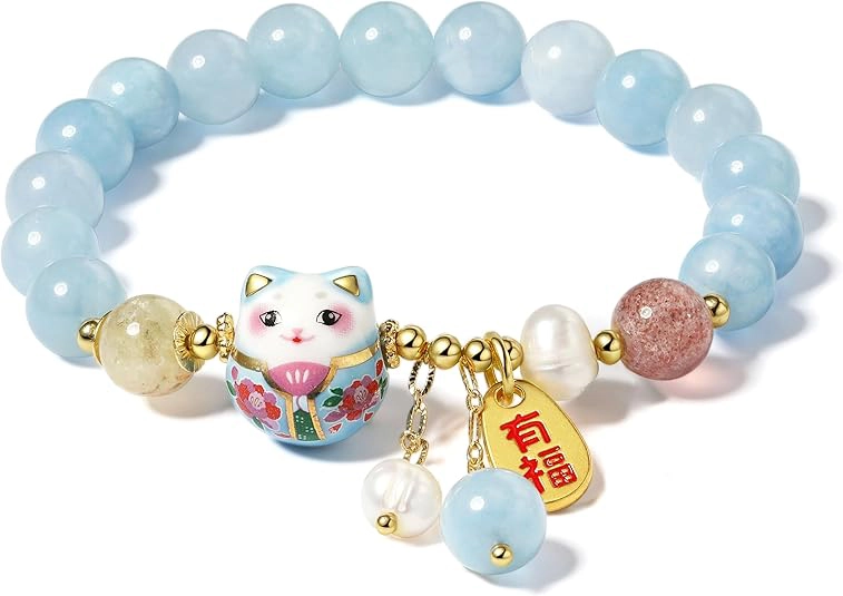 light blue bead bracelet close up with cat charm and bead details