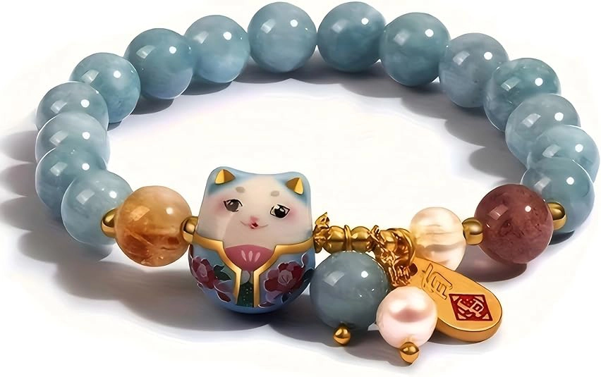 lucky charm bracelet for women cat charm detail blue beads close up