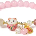 pink lucky charm bracelet with soft pink beads and cat pendant