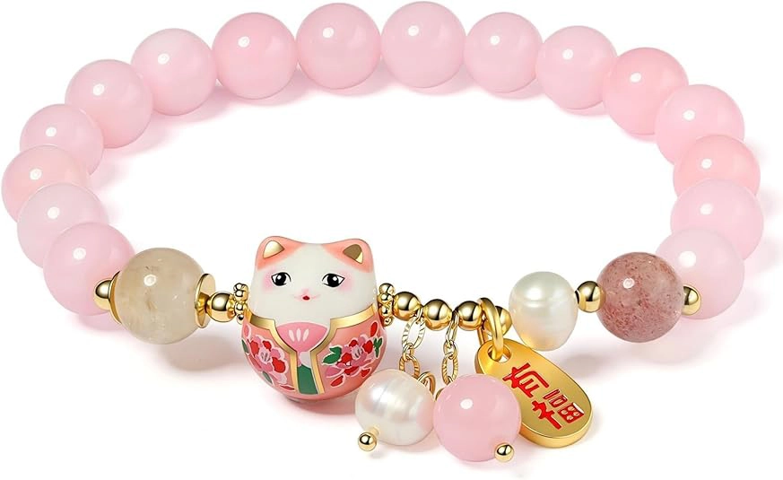 pink lucky charm bracelet with soft pink beads and cat pendant