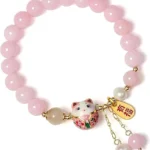 pink lucky charm bracelet full circle view with smooth bead design