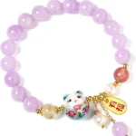 purple lucky charm bracelet with lavender beads and cat pendant