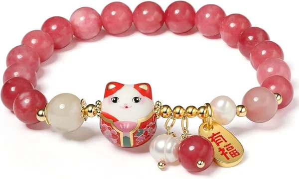 red lucky charm bracelet with glossy beads and cat pendant